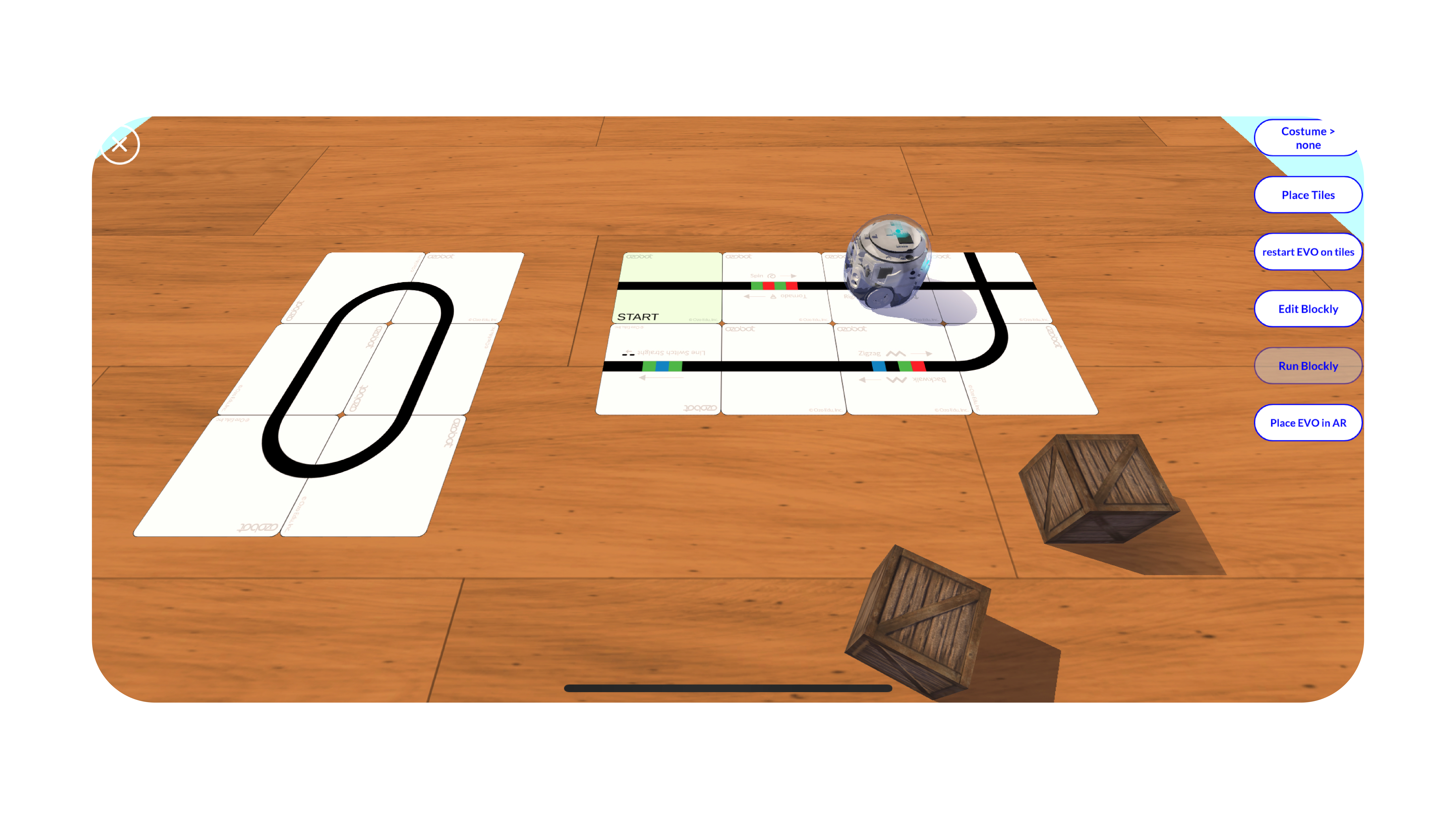 Evo running on a printed track with the AR menu, Costume, Place Tiles, Blockly, open beside it